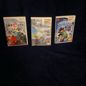 Nintendo Wii Disney Game Bundle - White Cases with Colorful Covers